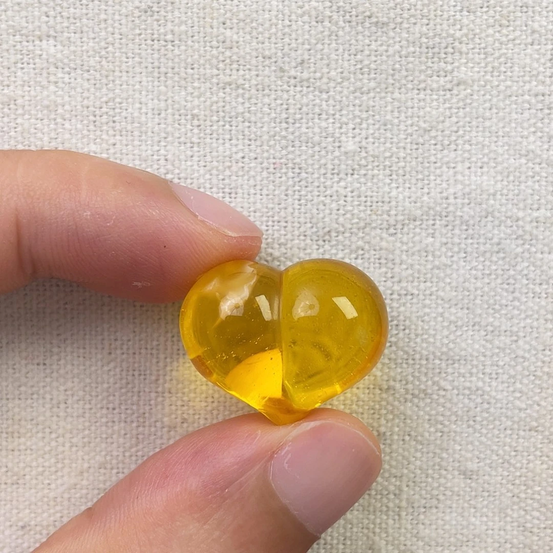 裸石琥珀未镶嵌瓷白金沙屁桃