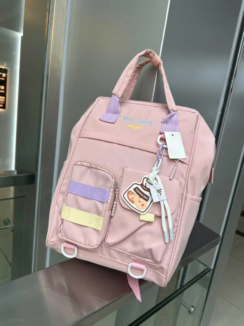 新款热卖旅行包韩版高品质双肩纯色休闲手提款妈咪包百搭