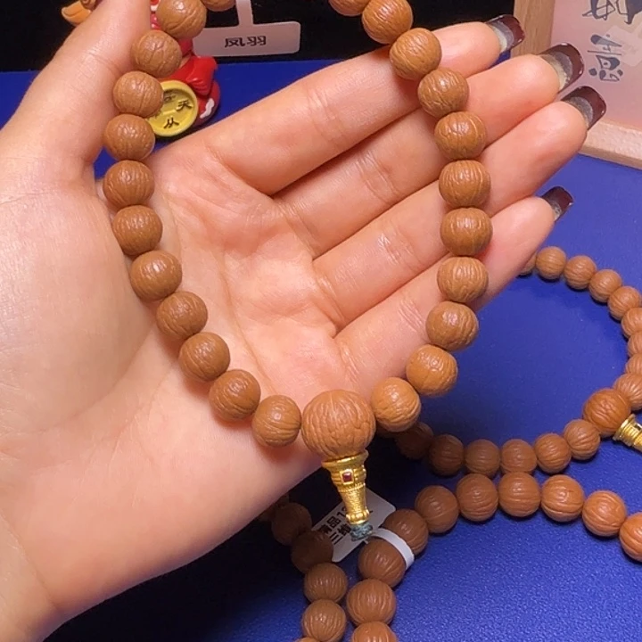 海***木吊坠猴头核桃凤羽