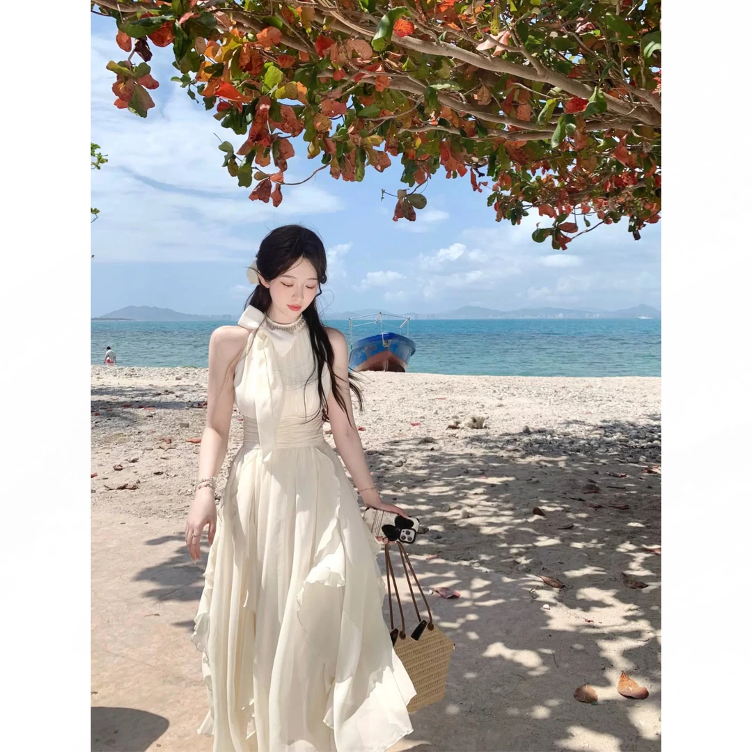 长岛香氛初恋无袖挂脖连衣裙收腰荷叶边法式白色温柔风气质长裙子