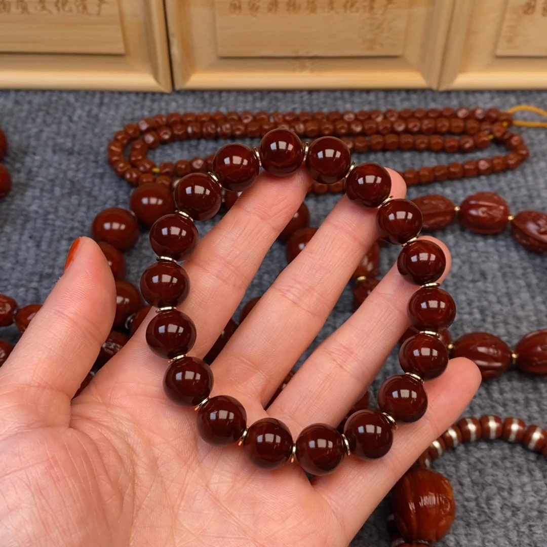 牛***学橄榄核手串/手链光柱