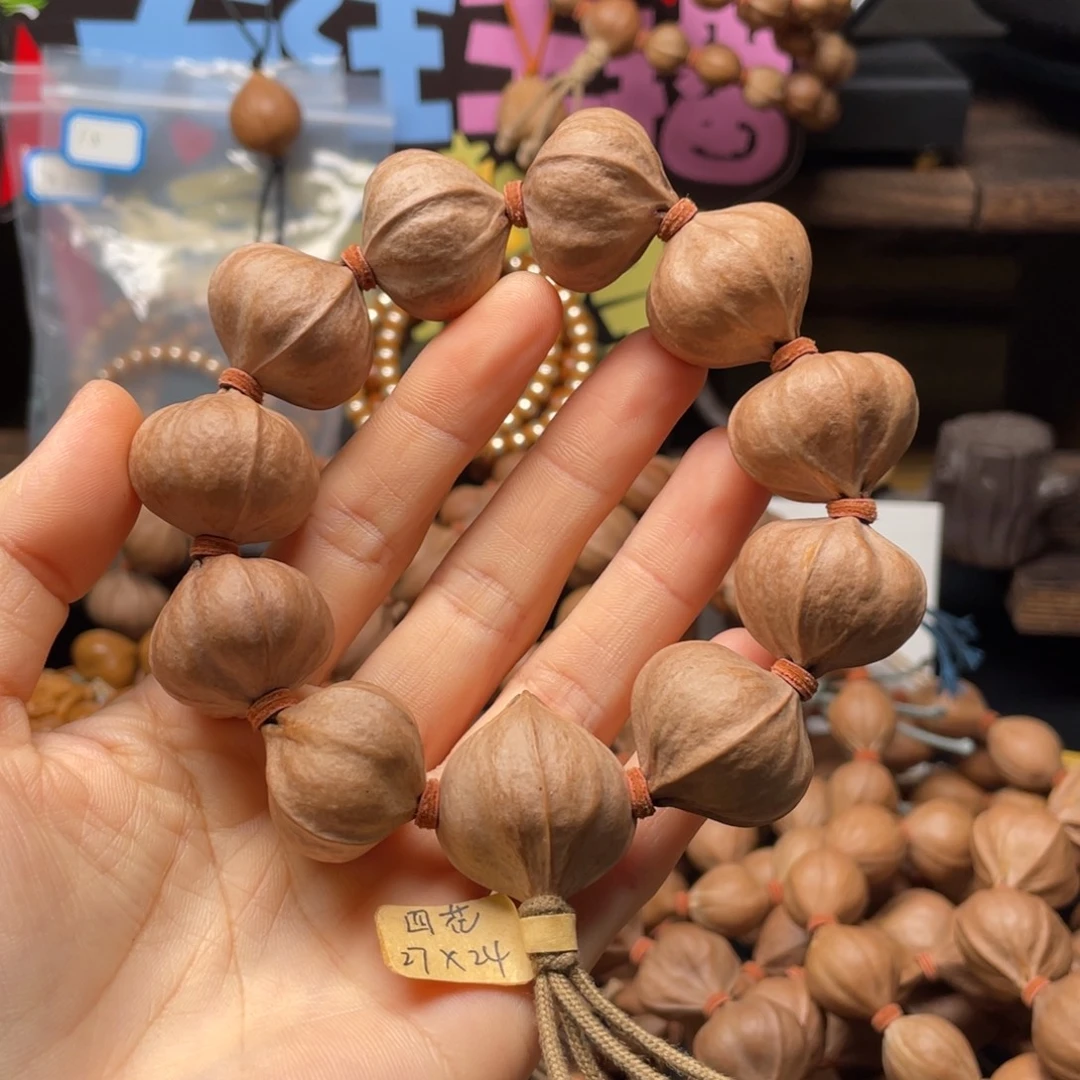 一***水吊坠橄榄核2724四花铁核