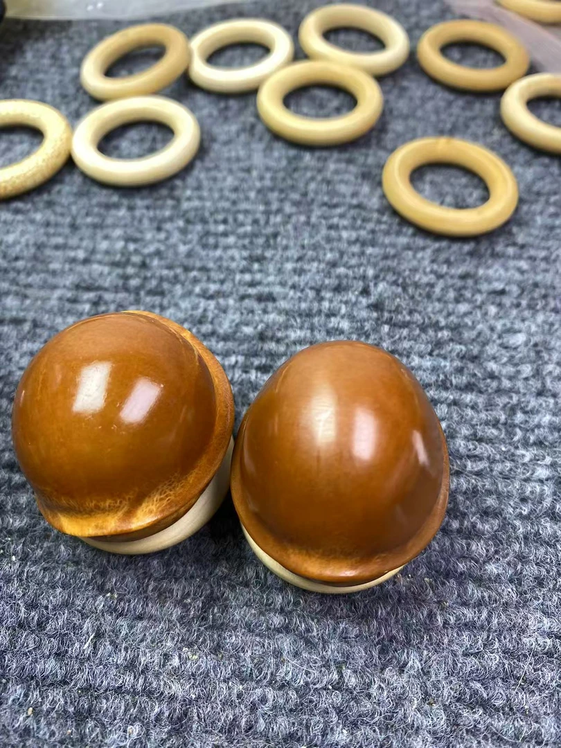 天然橄榄核雕刻元宝手球饱满压手感好寓意招财进宝