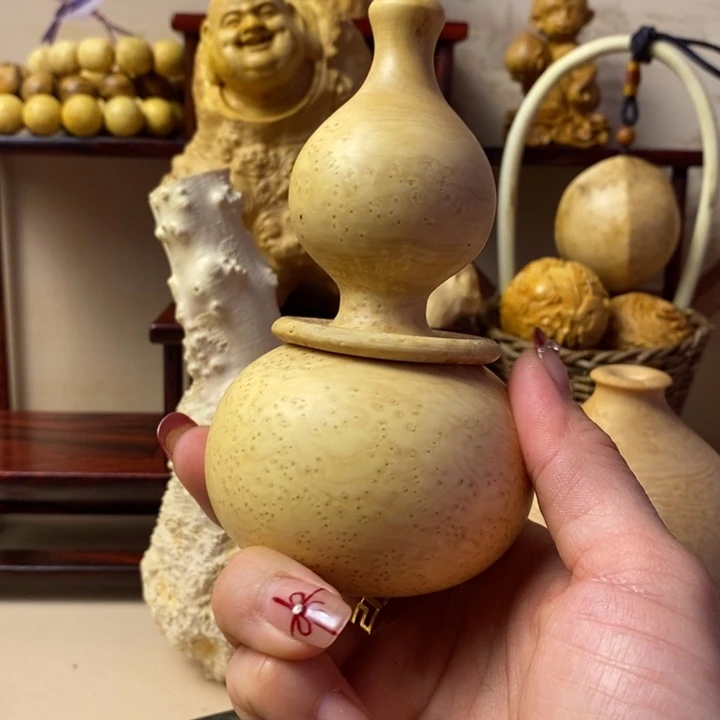 香榧木金**业黄杨木手把件