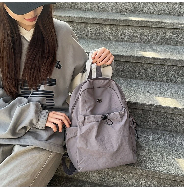 高颜值轻便高中生短途旅行包百搭双肩背包小众纯色运动包大学生