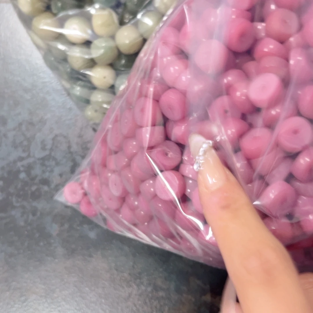 白玉菩提吊坠z12mm50颗。粉大肠