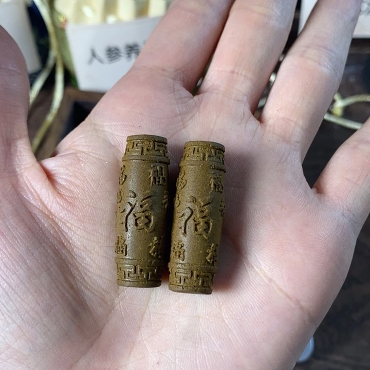 泥塑五行黄雕刻件2个装