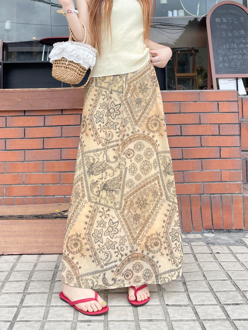 美式度假风印花半身裙女2025夏新款设计感显瘦长裙大码气质a字裙