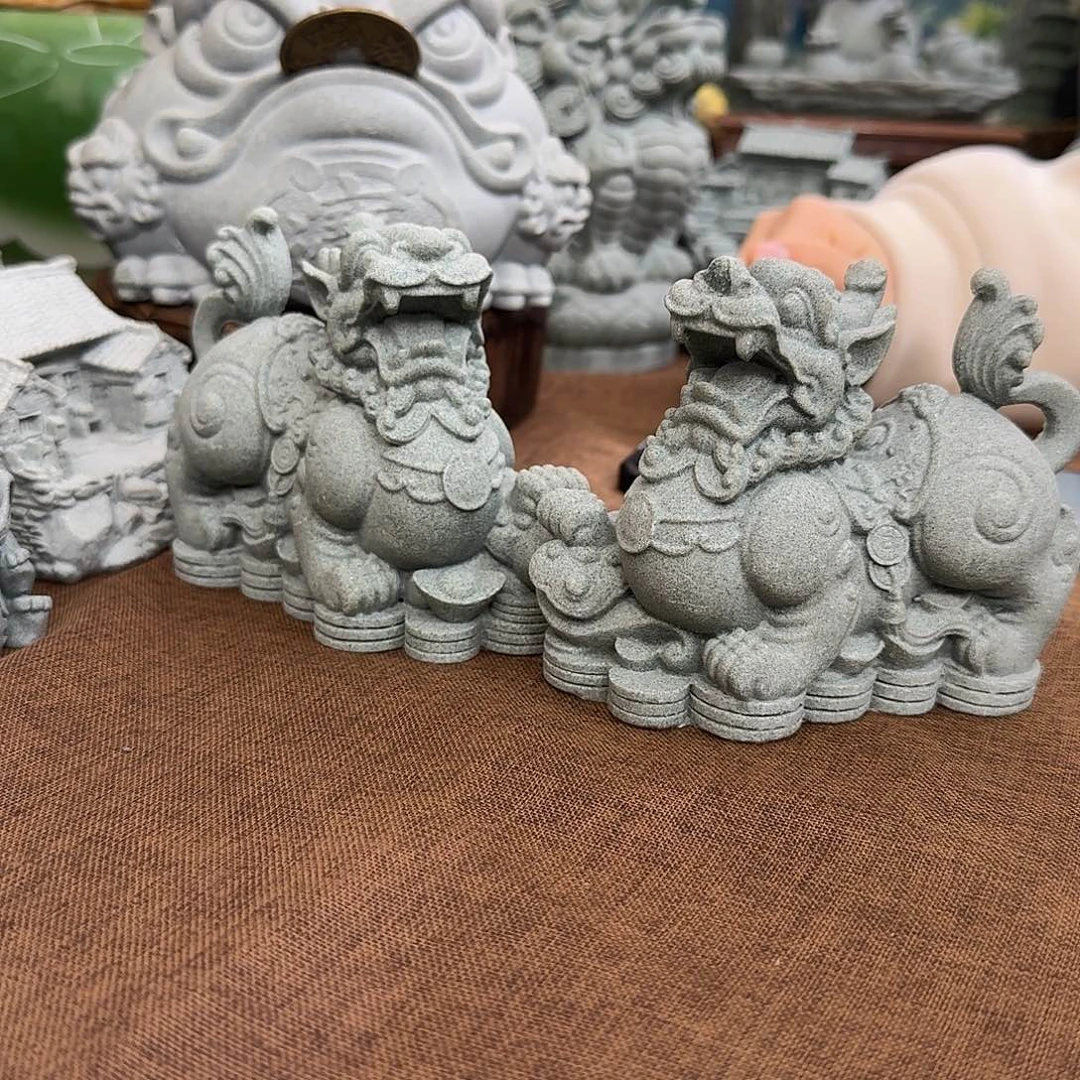 石材青砂石脚踩铜钱貔貅一对