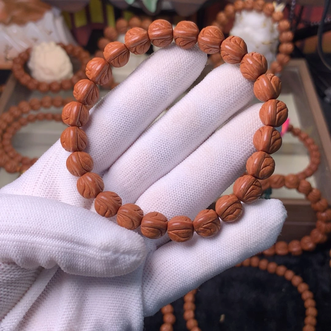 M***N桃核吊坠玉龙脊手串10