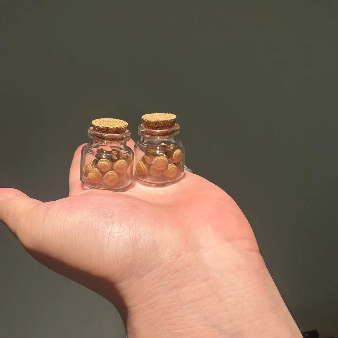 f385 精致瓶装丸拍一发二