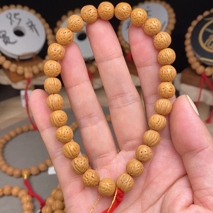 桃核手串金蝉子边尺0.9抛光尺寸误差0.5mm之间