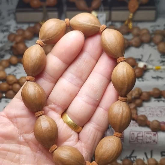 橄榄核手串/手链橄榄核手串 1.7 三花铁核三面佛