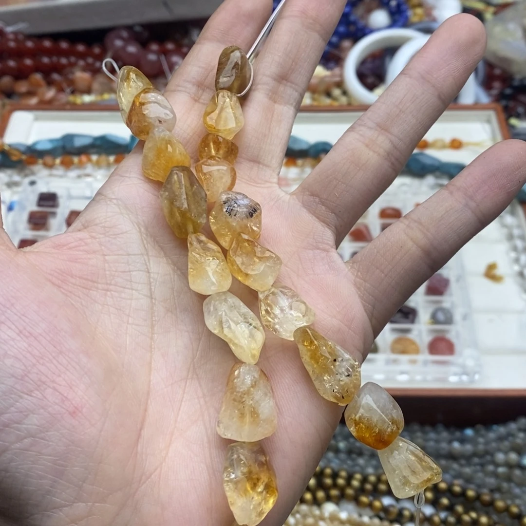 玛瑙/玉髓未镶嵌珠宝半成品一条十个天然黄塔晶通孔原石
