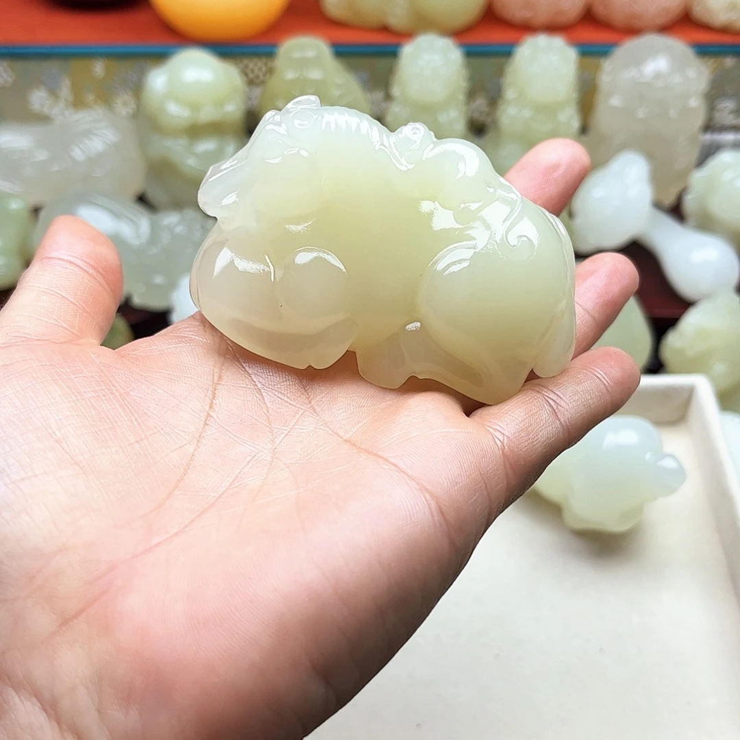 苏***丸石材马上封侯手把摆件