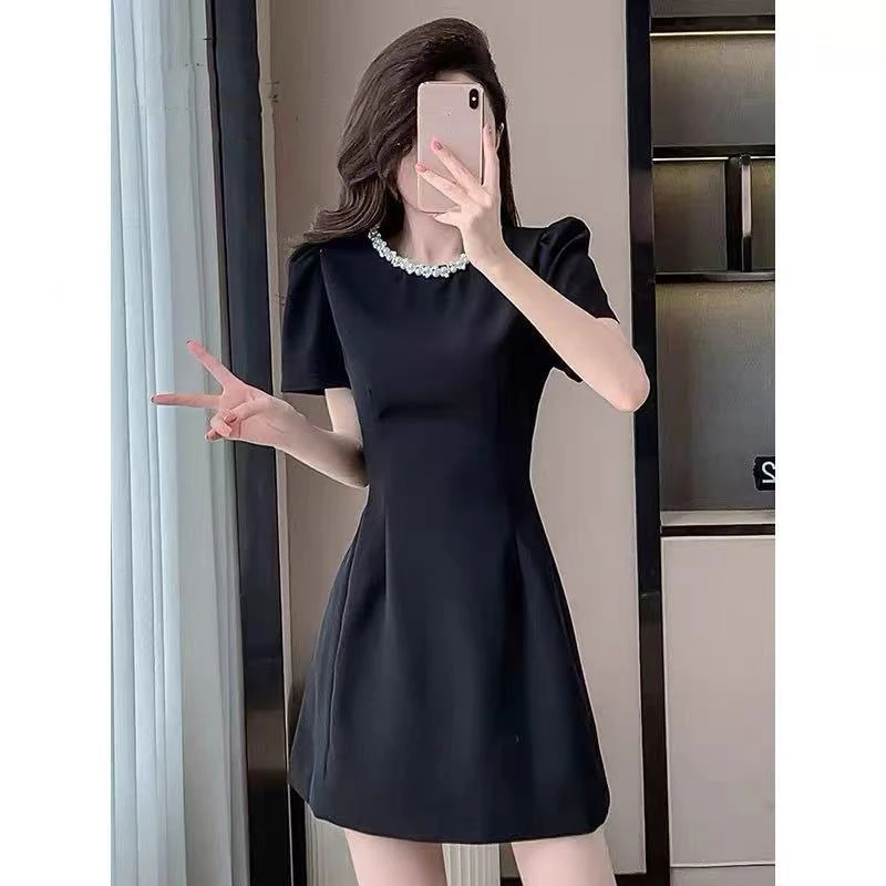 丹丹精选--258720新款重工钉珠圆领短袖气质连衣裙