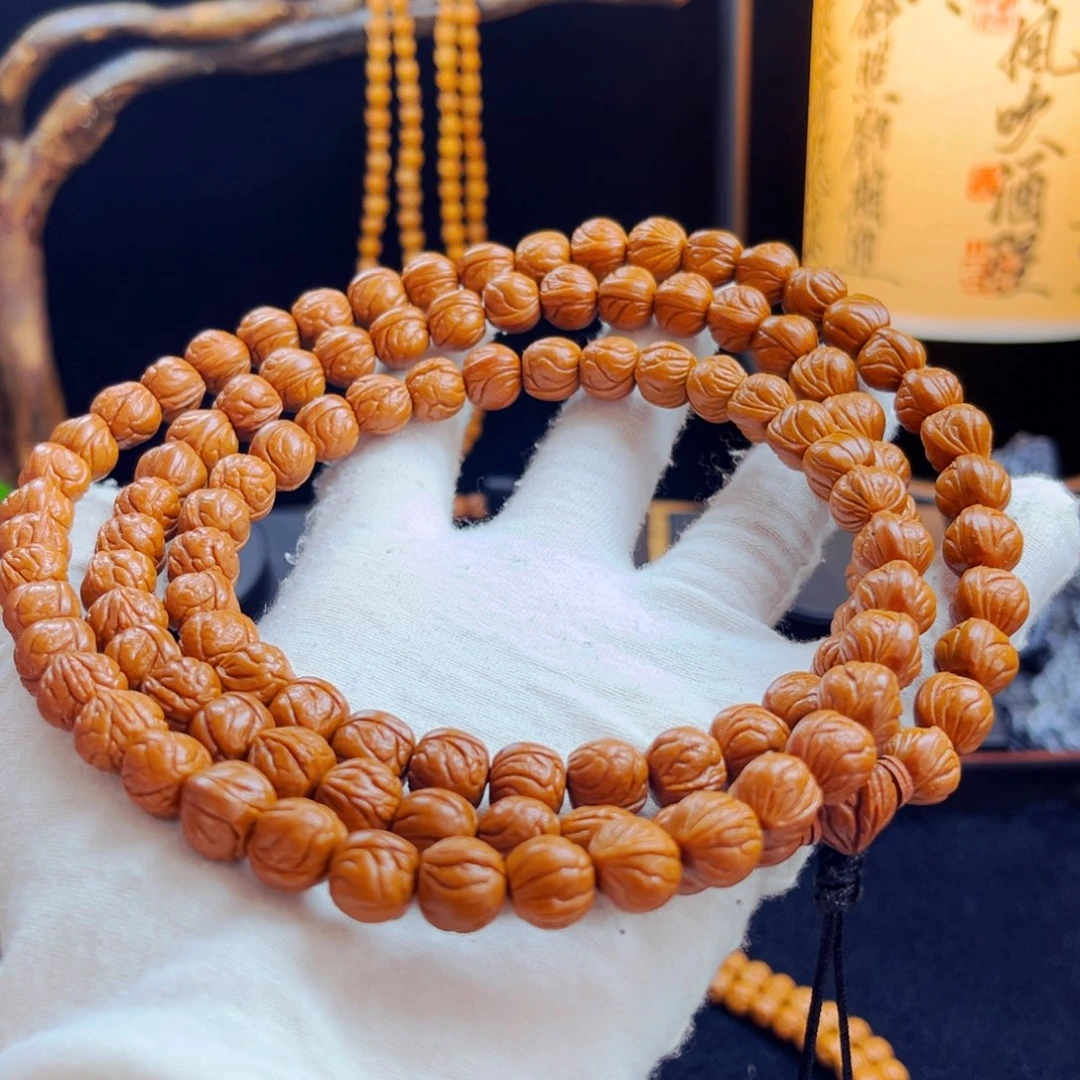 莫***白吊坠桃核野生桃核