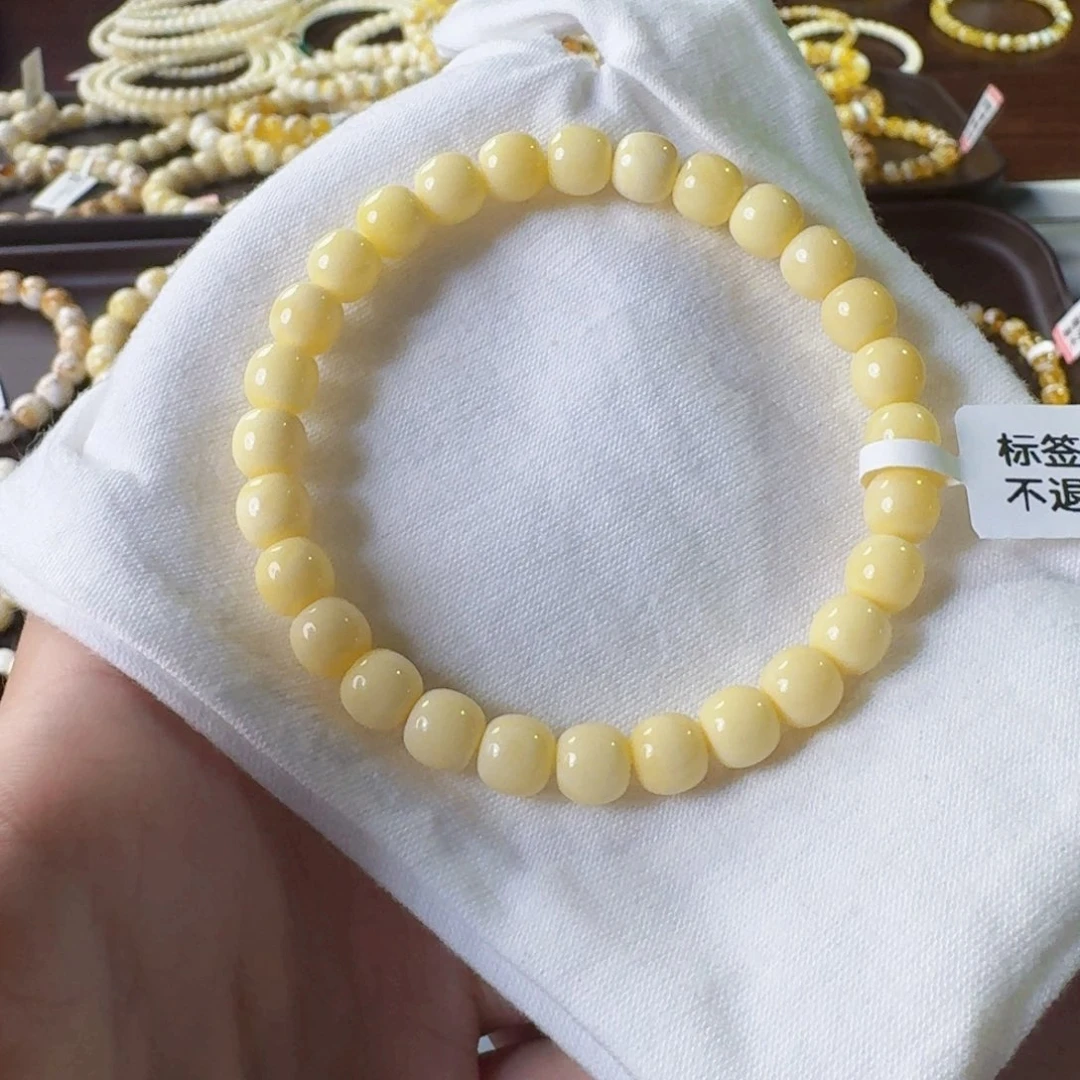 春***明裸石琥珀未镶嵌7mm奶豆