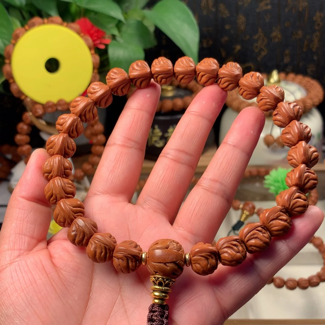 我***力吊坠桃核双脊龙手持14新品