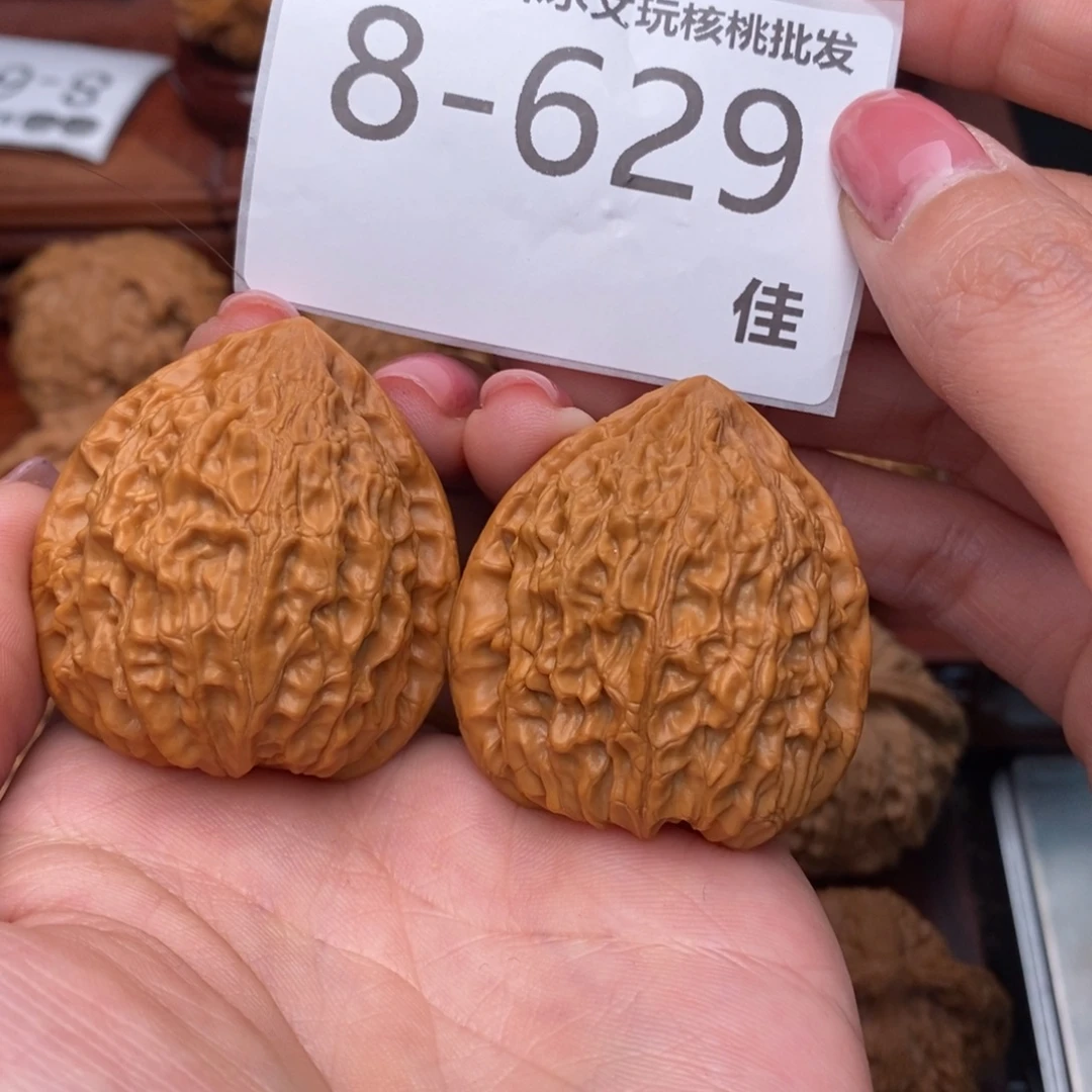 文玩核桃把件40金牛