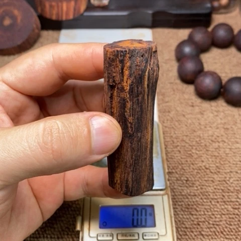 藤类29克降真香海南糖结手把件