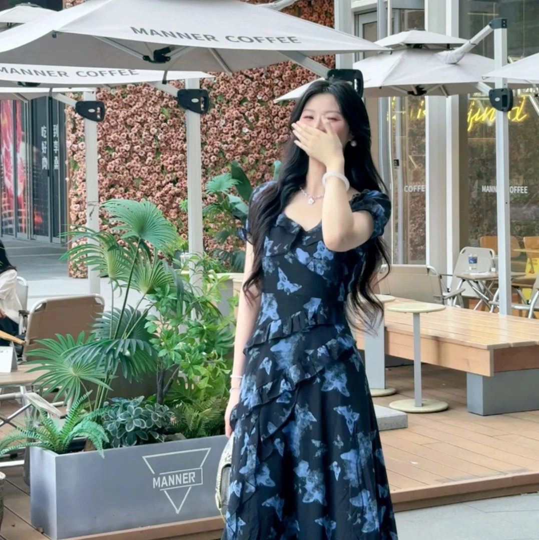 不规则荷叶边碎花连衣裙2025夏季新款收腰裙子