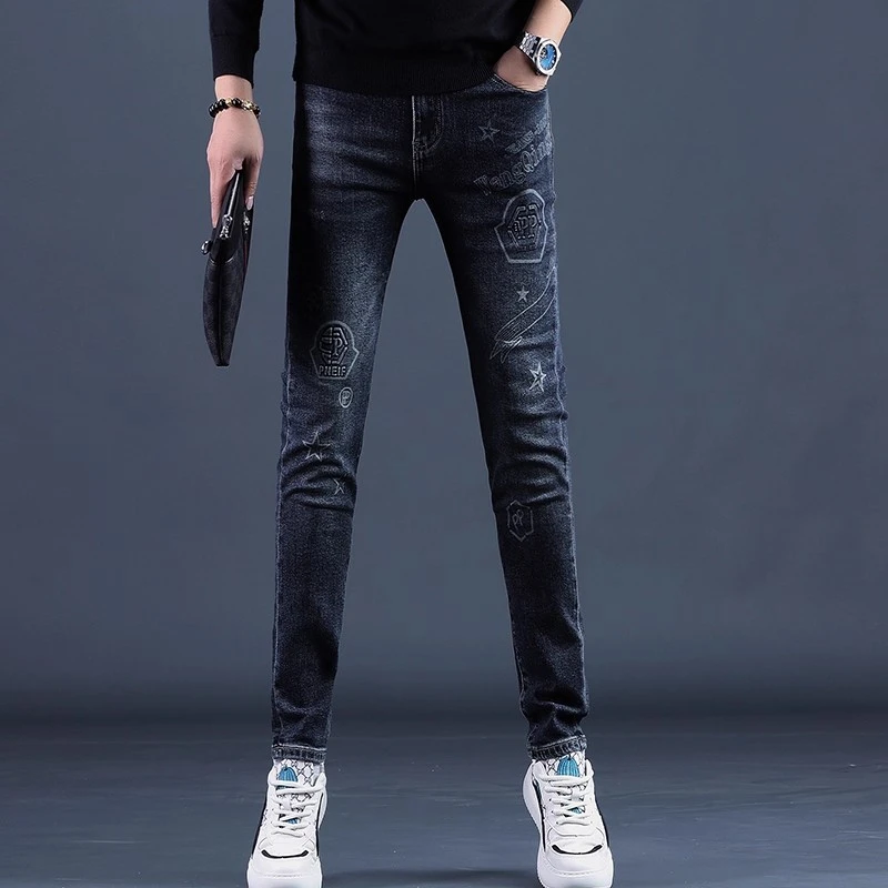 One What秋季新款男士印花高档牛仔裤潮牌修身小脚休闲压花男裤