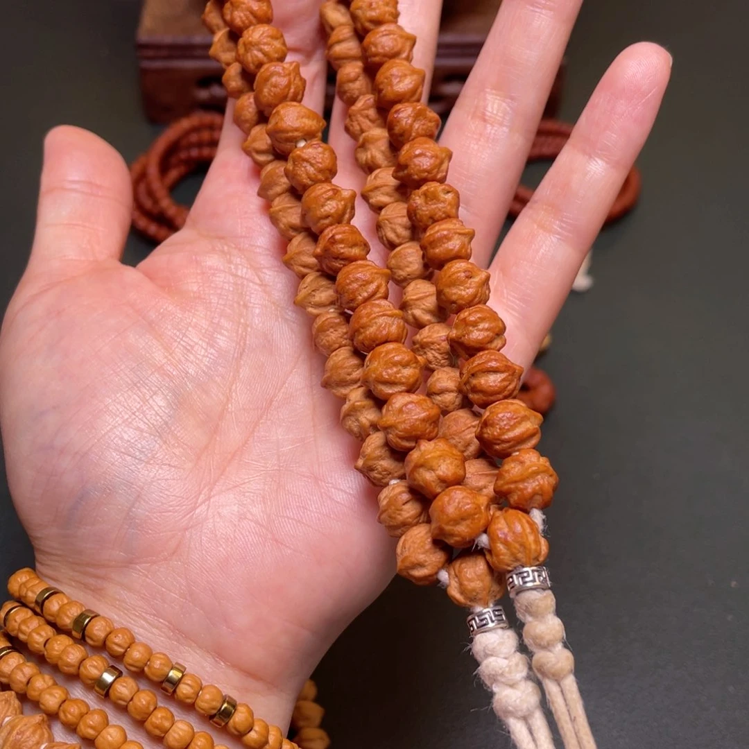 柏香籽/百香籽吊坠白牙横打手持