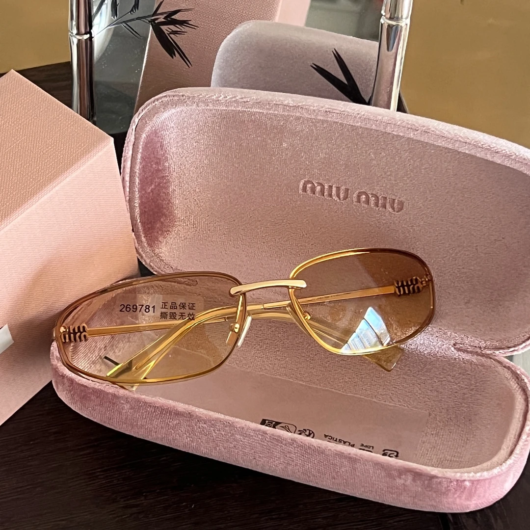 95新 MIU MIU/缪缪 千禧一代-茶色猫眼墨镜-14393928