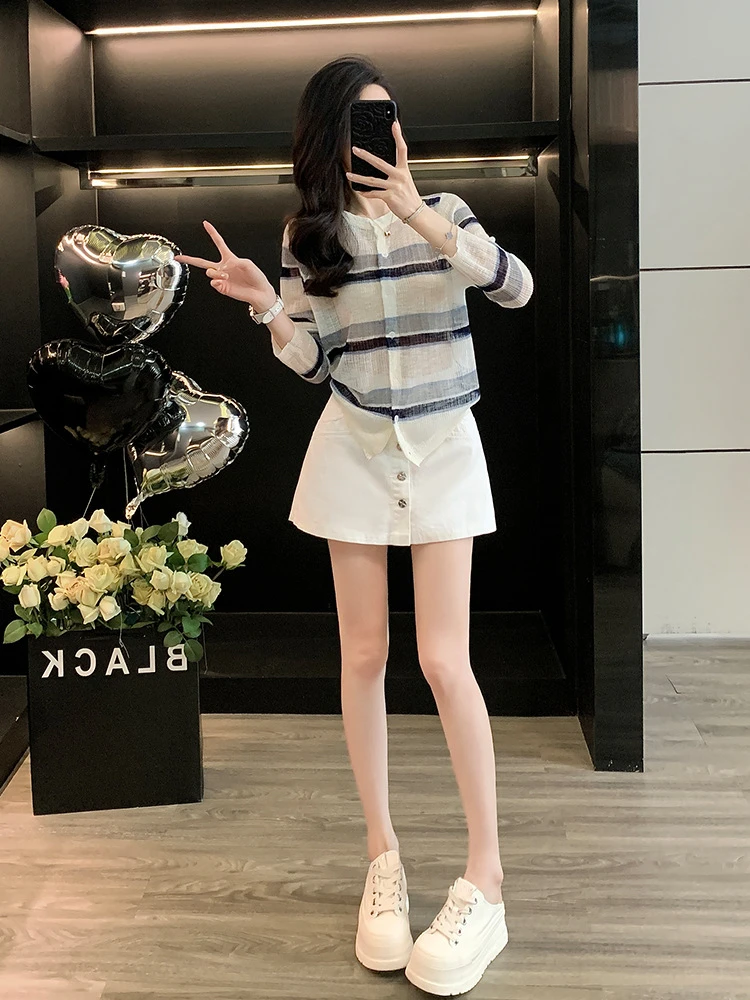 时尚减龄气质穿搭一整套女秋条纹针织长袖宽松开衫牛仔短裙两件套