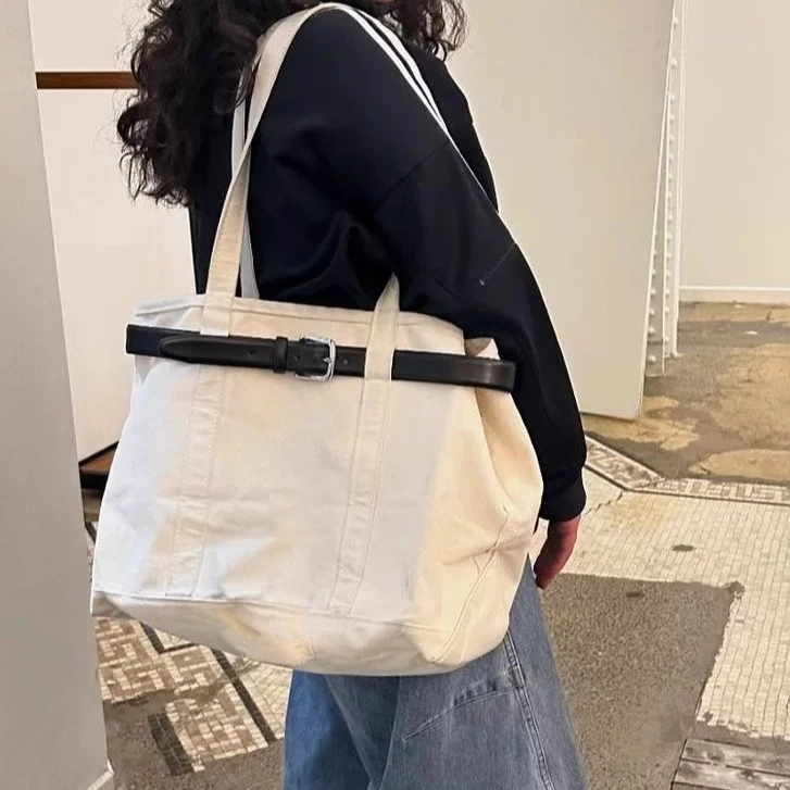 2025新网红同款时尚百搭拼接帆布包休闲皮带托特设计手提单肩包包