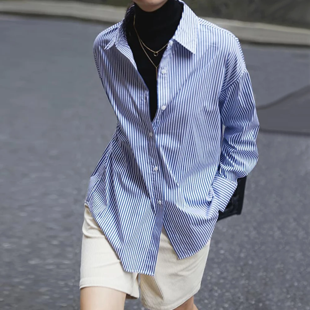 韩版高级感蓝色条纹衬衫女2025年春季新款气质单排扣长袖翻领上衣