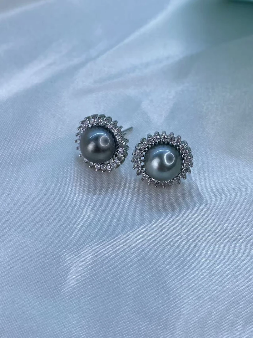 【佳怡专享】S925银9-11mm海水大溪地太阳花耳钉