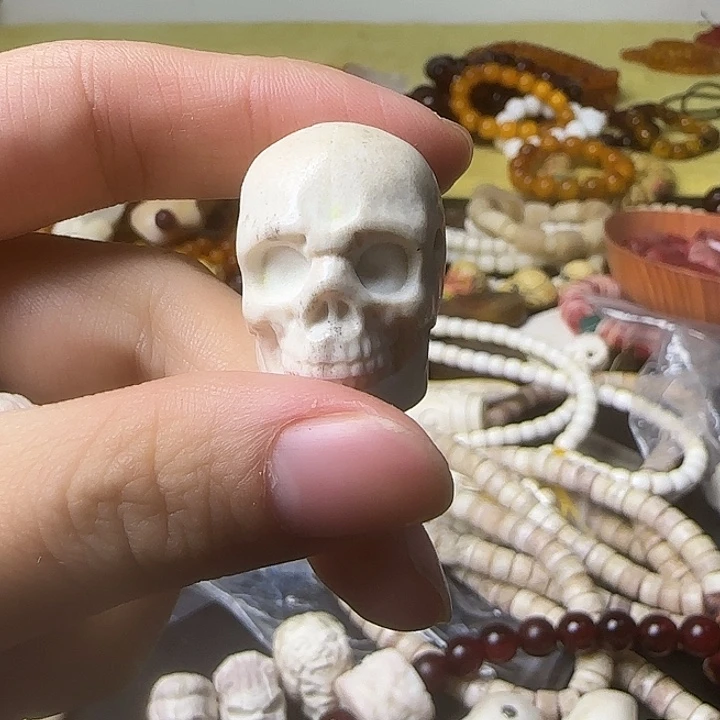 从*梅花鹿角雕刻件骷髅三通