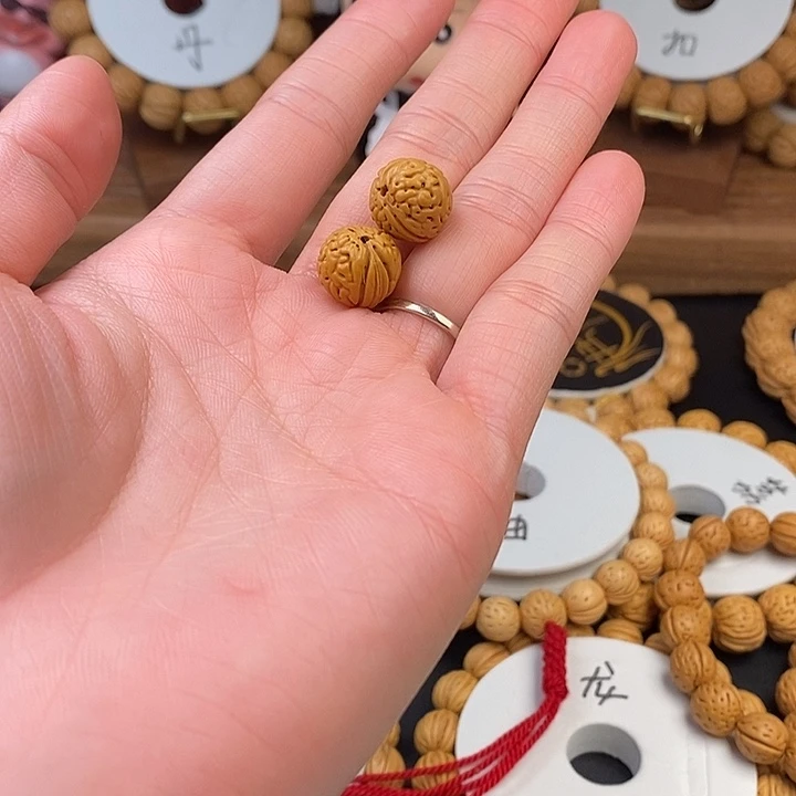 桃核手串B****?补籽的运费。