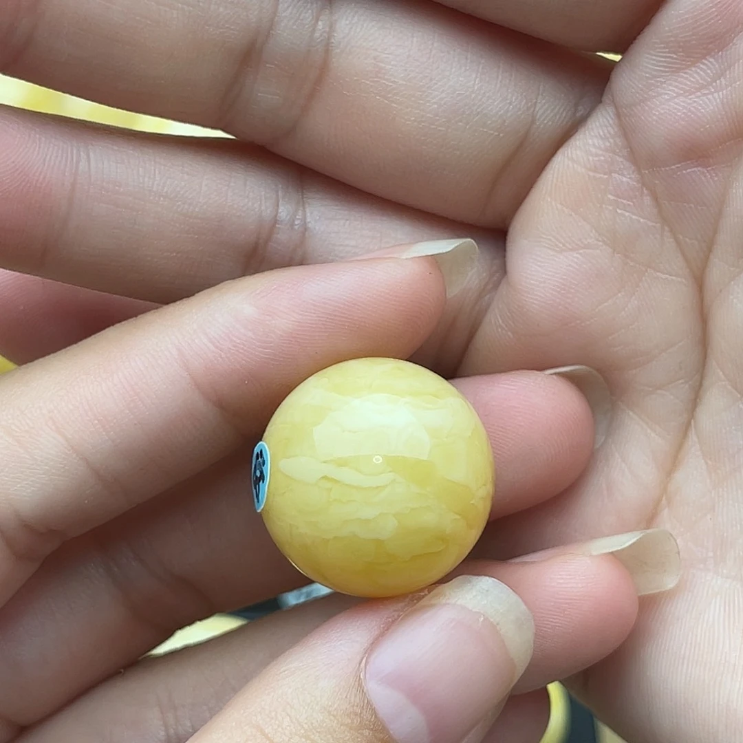 裸石琥珀未镶嵌阳**意蜜蜡圆珠梦