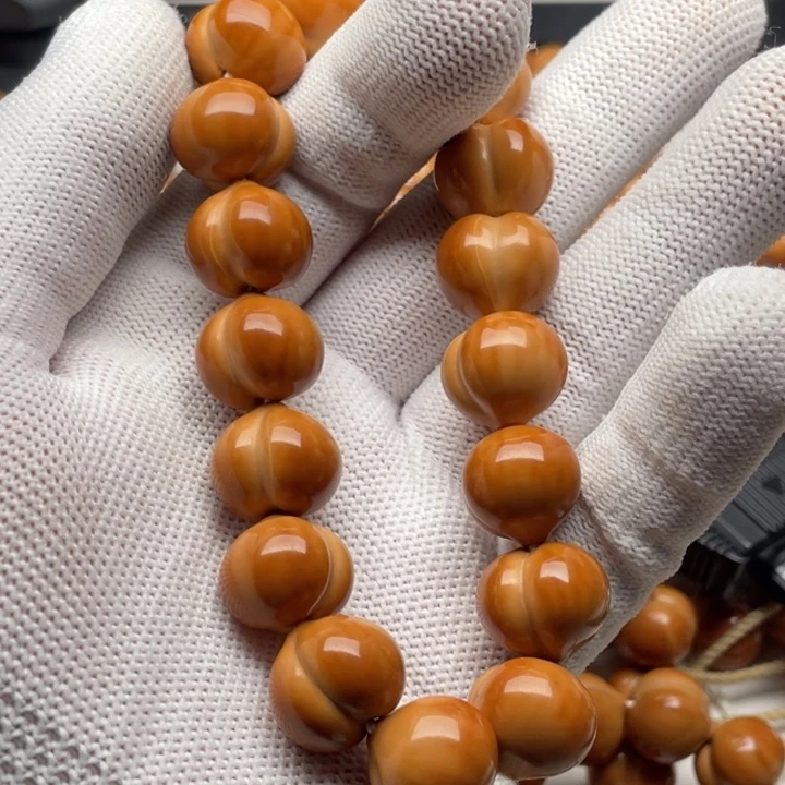 乐***中手串猴头核桃屁桃