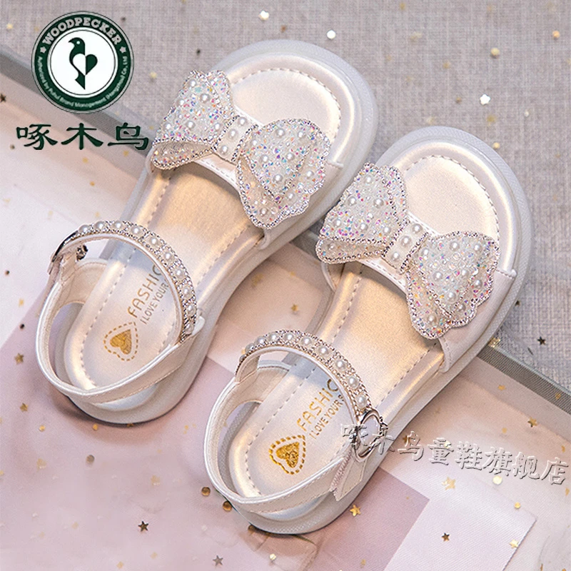 啄木鸟女童凉鞋公主夏季2025新款儿童鞋软底女孩蝴蝶结宝宝水晶鞋
