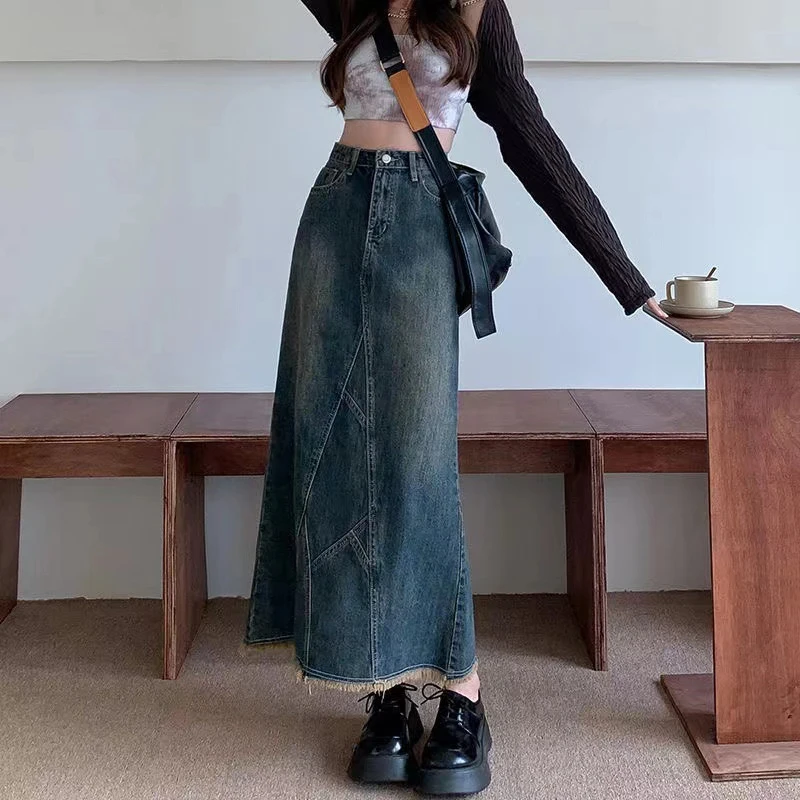 后开叉高腰显瘦牛仔半身裙女2024秋季新款毛边设计感小众包臂裙女