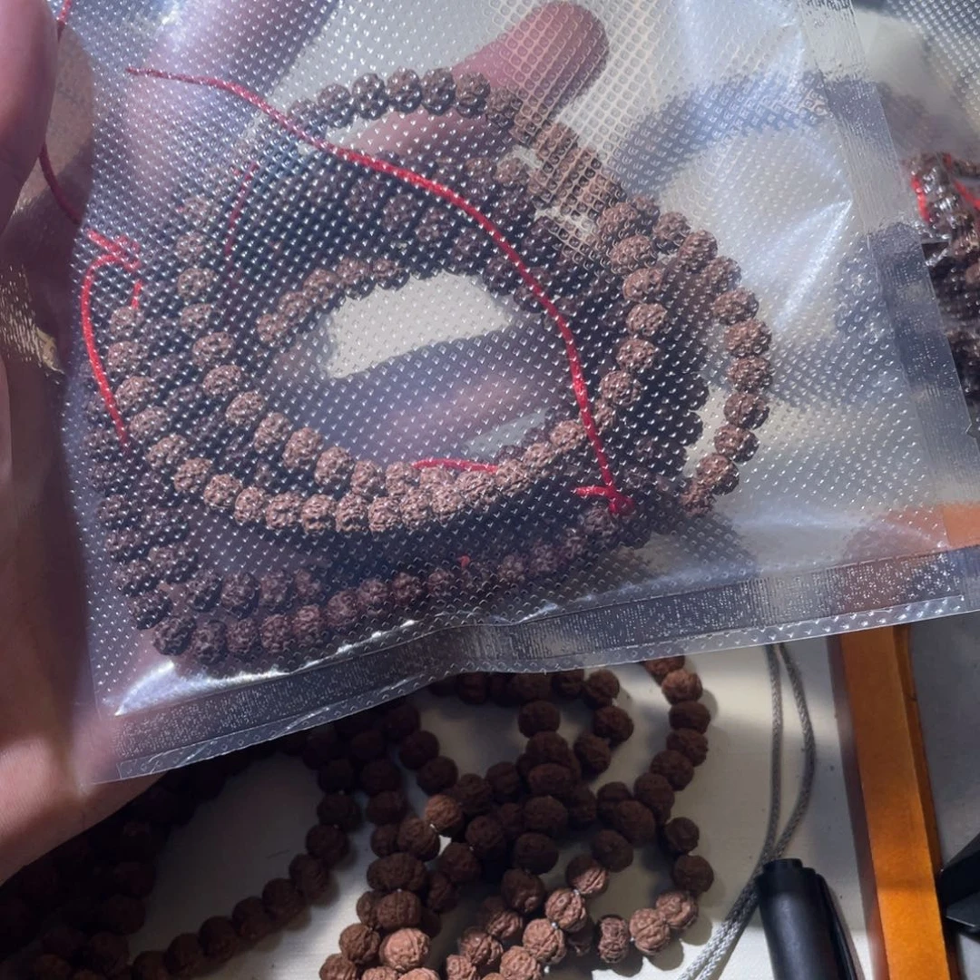 苏***员金刚菩提吊坠红方印