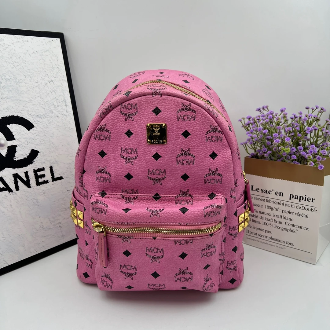 95新 MCM 粉色小号双肩包8219