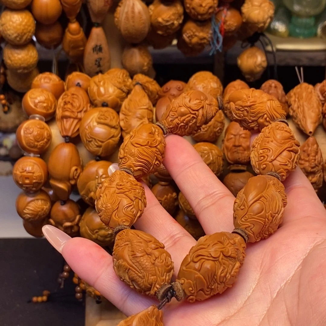 橄榄核手串/手链风****?龙达摩