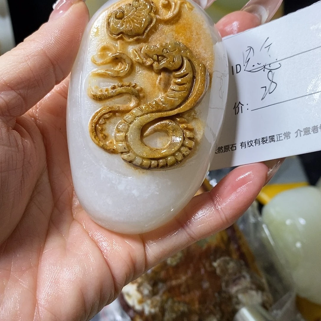 石材思****笑古青石手把件