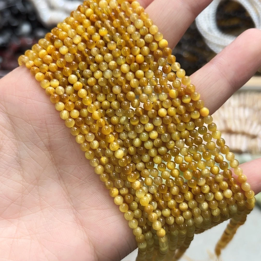 玛瑙/玉髓未镶嵌珠宝半成品卡3金虎眼圆珠一条