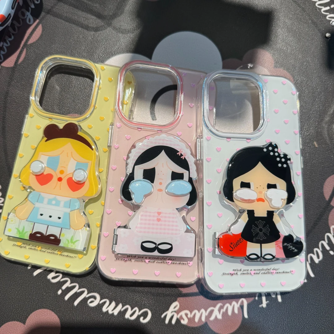 潮酷爱心波点哭娃适用于iPhone16镜子支架华为亚克力17promax壳