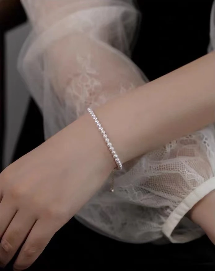 707 天然小米珠手链3-3.5 近圆微瑕 s925银延长链