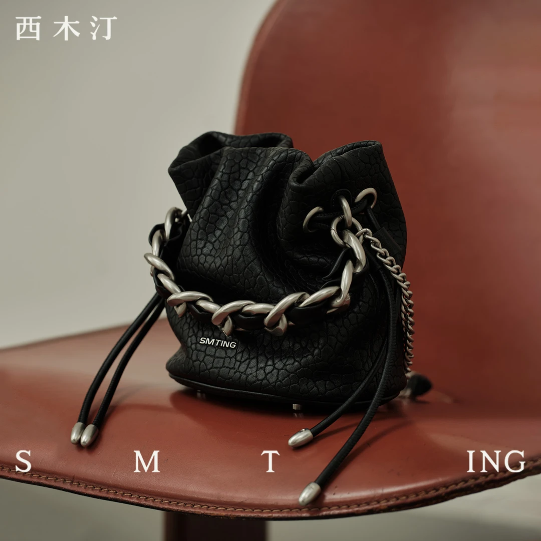 西木汀  去流浪 牛皮链条时尚水桶包女小众单肩包高级感斜挎小包