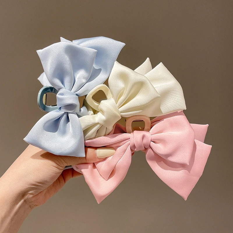 布艺蝴蝶结抓夹女夏季新款后脑勺设计感鲨鱼夹发夹夹子头饰
