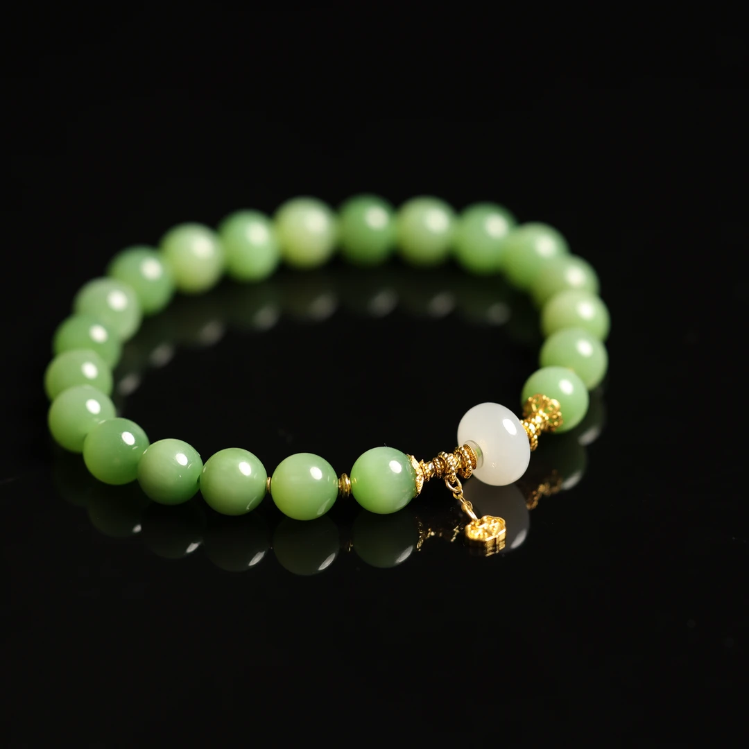 一团和气 | 严选精品和田玉高色粉绿猫眼手串