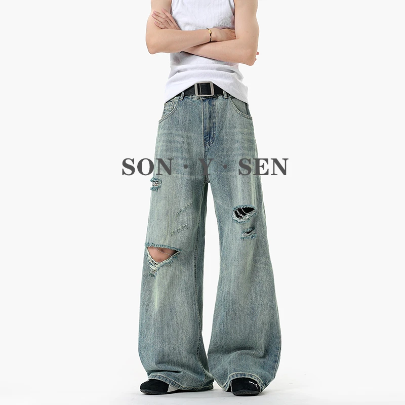秋冬美式巴黎破洞竹节纹弯刀牛仔裤男女同款宽松百搭阔腿情侣长裤